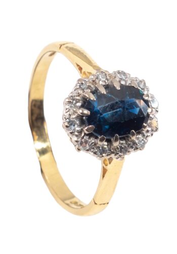Ca. 1989 - Entourage ring with sapphire and diamonds