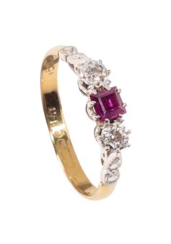 Dated 1973 - Trilogy ring with ruby & diamonds