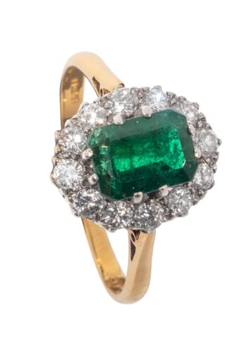 Dated 1959 - Entourage ring with emerald and diamonds