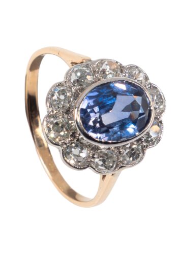 Ca. 1930 - Entourage ring with sapphire and diamonds