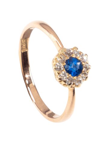 Ca. 1910 - Entourage ring with sapphire and diamonds